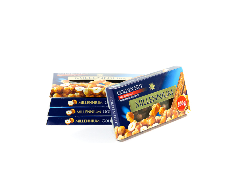 Milchschokolade “Millennium Gold” mit ganzen Haselnüssen 100 g